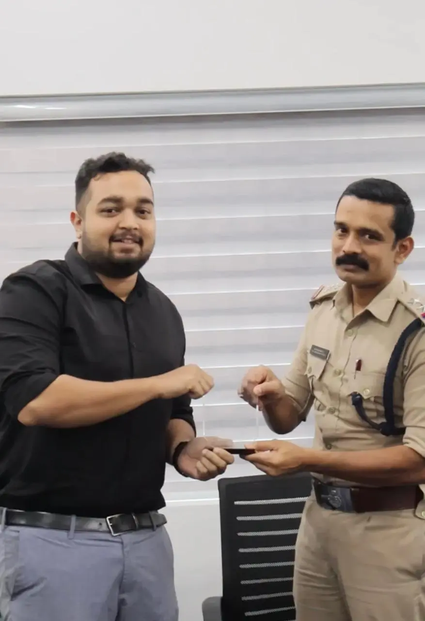 Giving award to police officer